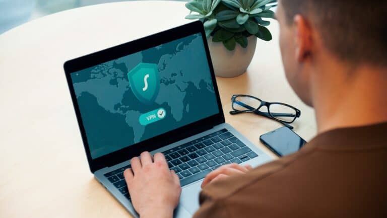 A person accessing VPN using a laptop
