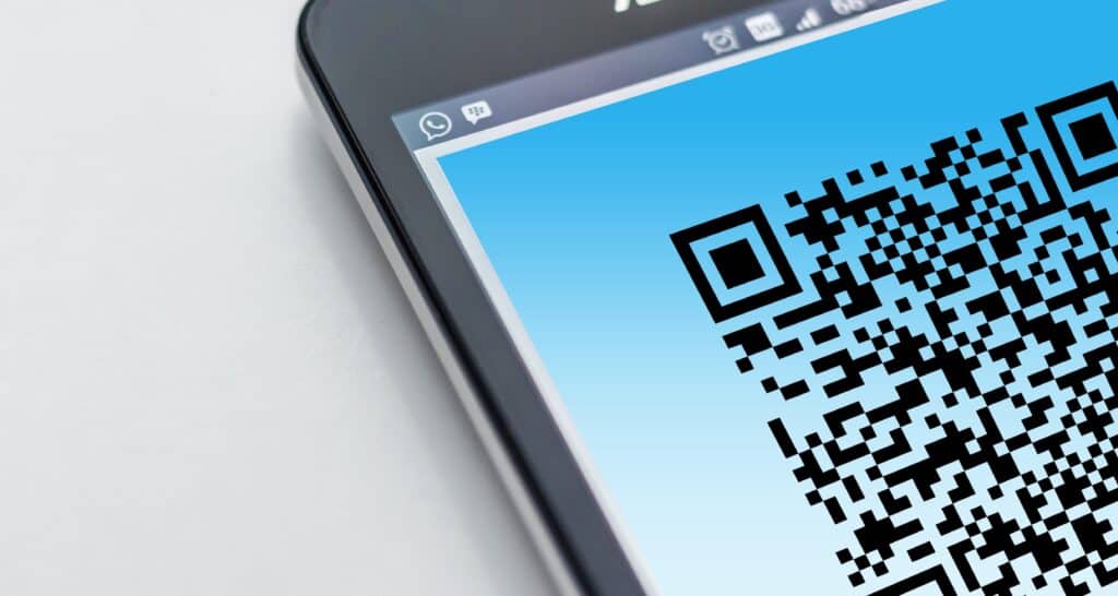 The corner of a phone screen displaying a QR code.