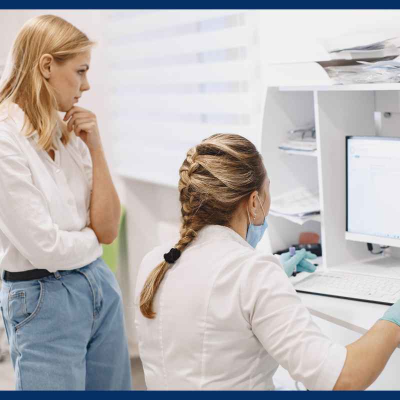 IT support for medical practices: clinic staff reviewing an EHR in Central Texas
