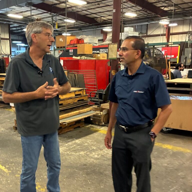 Manufacturing cybersecurity protecting connected machinery on a modern Central Texas factory floor. Manufacturing cybersecurity