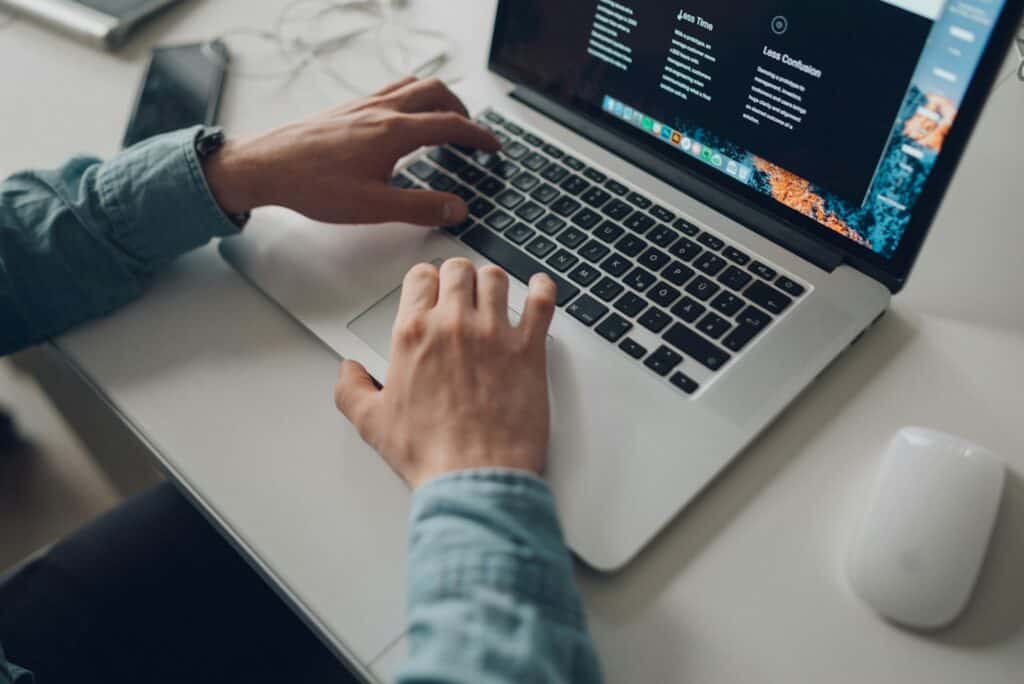 Accountant working on a laptop at a desk