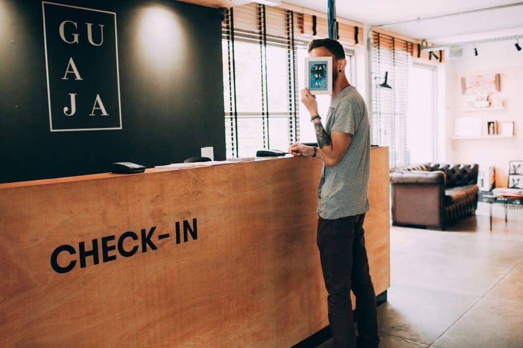Guest at a hotel check-in desk