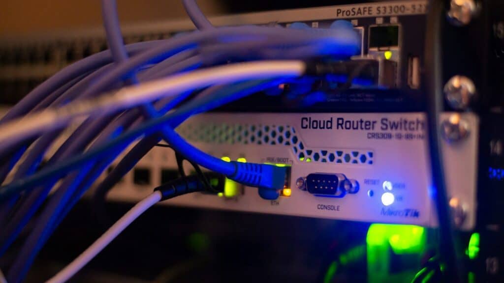 Network switch with connected cables in a server room