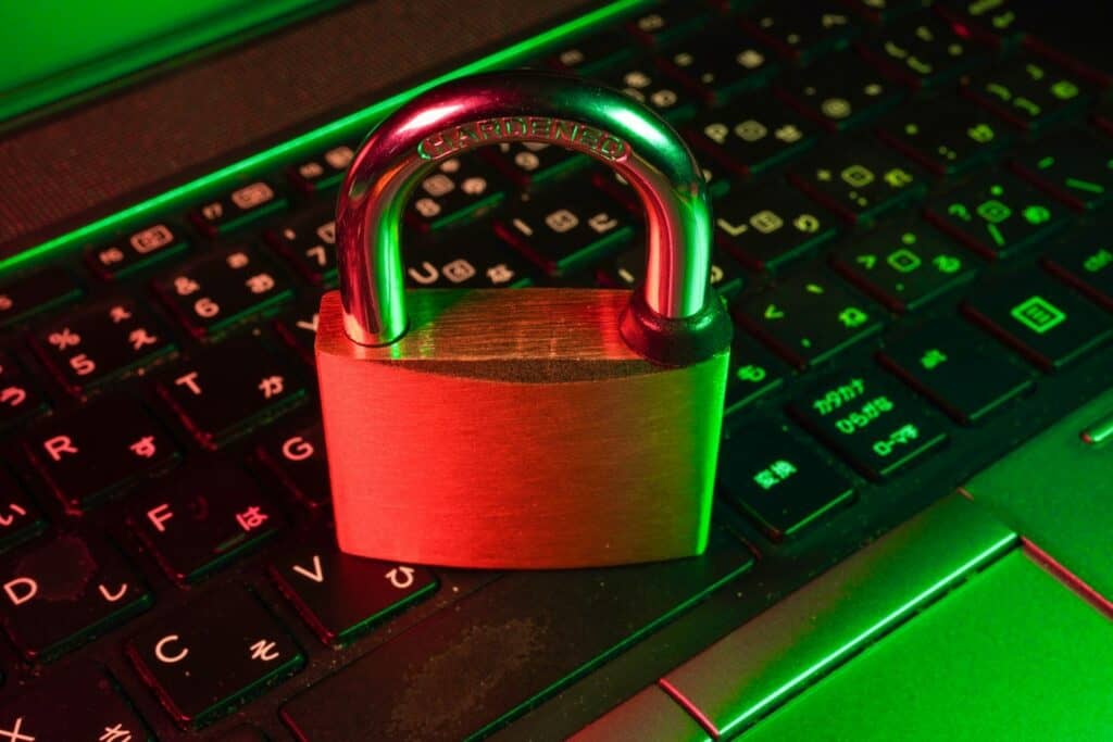 Red padlock on a computer keyboard, representing endpoint protection