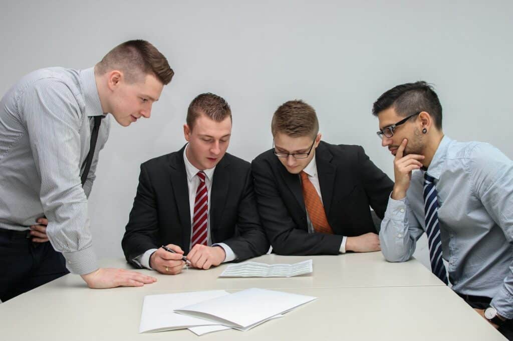 Team reviewing documents together at a conference table