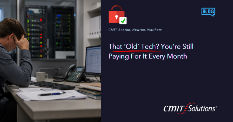 Stressed IT worker at a server room desk beside a CMIT Solutions blog banner about old tech costs.