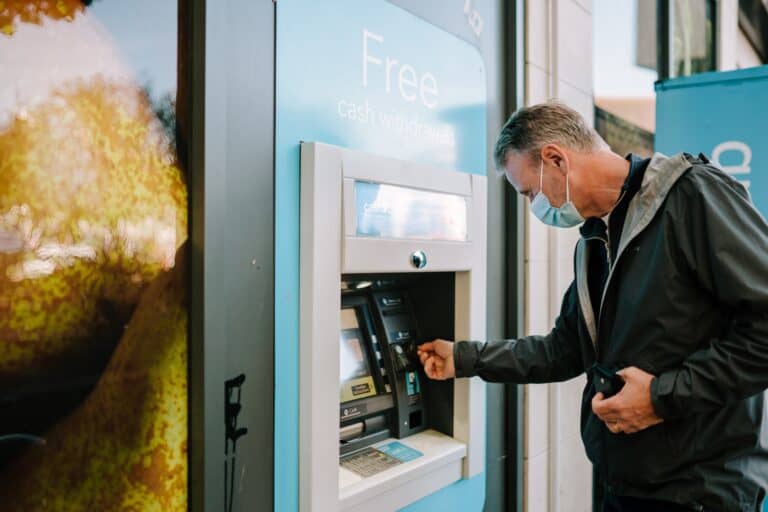 man using ATM