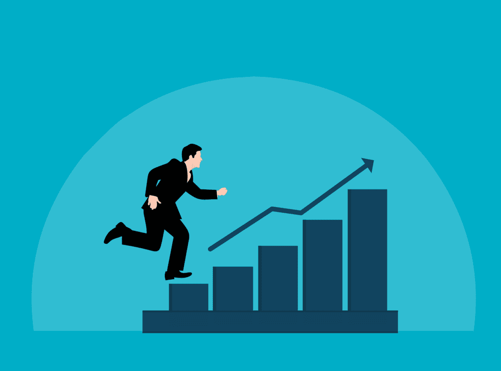 A business owner runs up an ascending graph showing business growth.