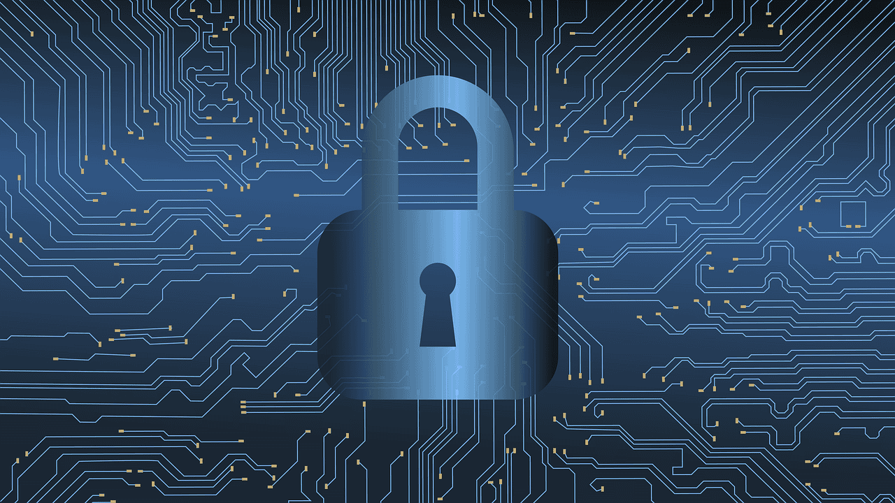 A blue lock on a background of circuitry depicts cybersecurity.