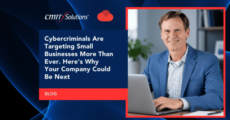Blog hero featuring a smiling man in a blue blazer typing on a laptop beside the headline about cybercriminals targeting small businesses.