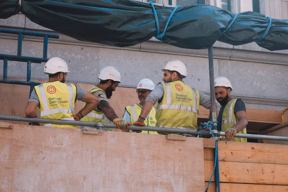 Construction team collaborating at a job site