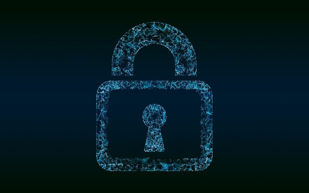 A blue lock made of circuitry depicts cybersecurity.