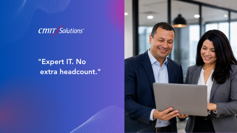 CMIT Solutions banner with the quote 'Expert IT. No extra headcount.' as two professionals review a laptop on the right side.