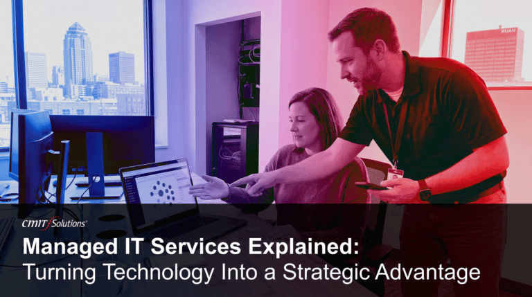 Managed IT services and strategic technology consulting in Des Moines: CMIT Solutions professionals reviewing network security and IT infrastructure on a laptop in a local office.