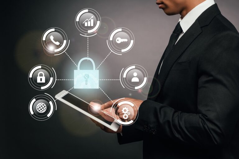 Businessman with tablet and digital lock icons