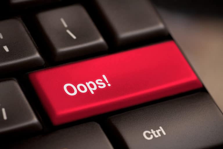 oops word on key showing fail failure mistake or sorry concept