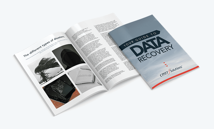 Open magazine with a cover reading 'Your Guide to Data Recovery' beside a two-page article and a four-image photo spread on the left.