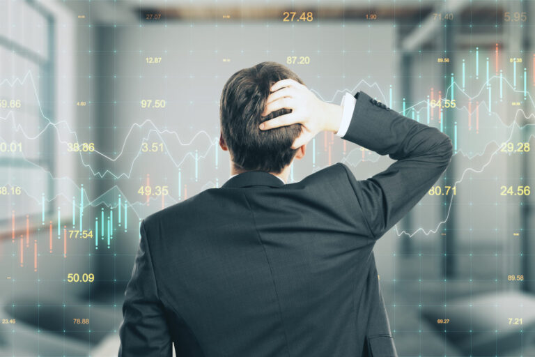 back-view-of-thoughtful-young-businessman-standing
