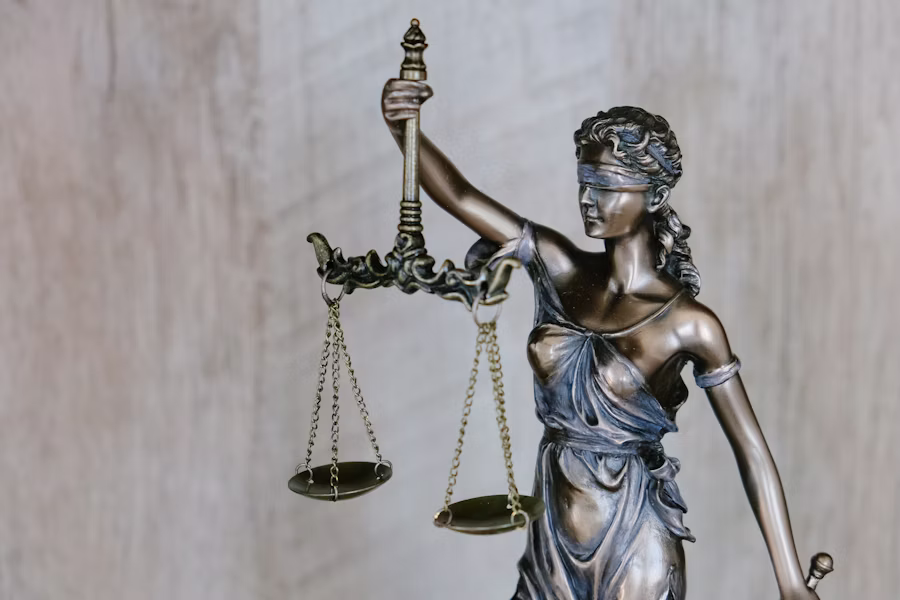 Attorney reviewing documents in a professional law office setting