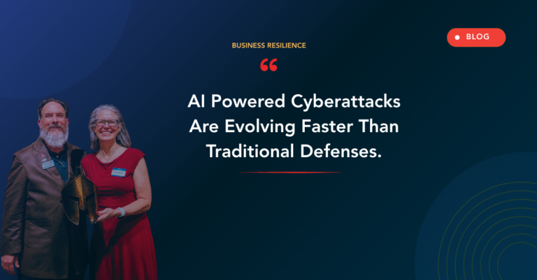Two smiling professionals on a dark blue gradient hero, a man and a woman holding a shield-like award, with the headline about AI-powered cyberattacks.