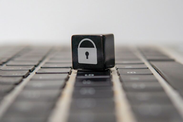 Black keycap with a lock symbol on a laptop keyboard