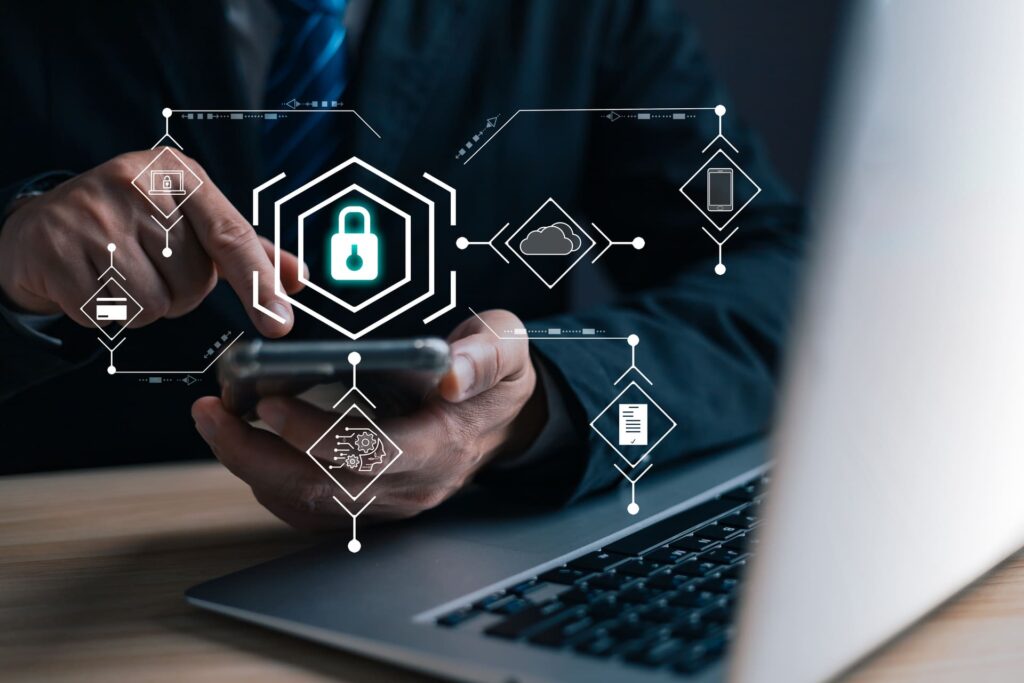 Businessman using smartphone with cybersecurity icons overlay