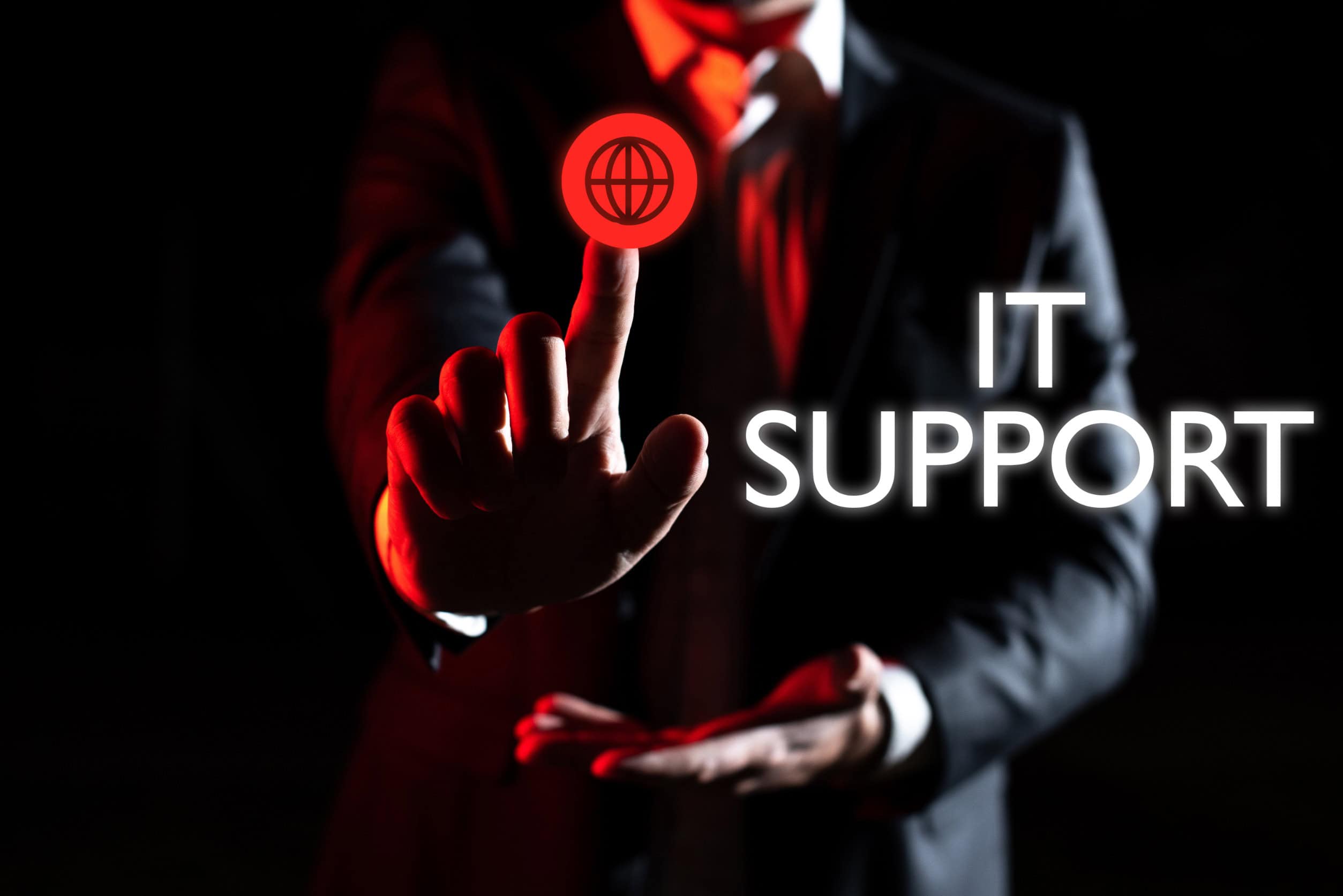 A businessman touches the "IT Support" button, seeking assistance with IT and related issues.