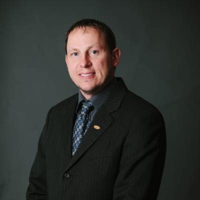Travis Cramer, President and CEO
