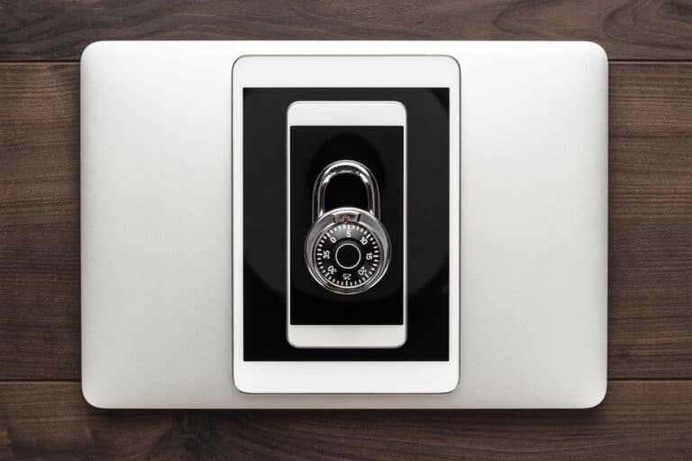 laptop tablet phone and padlock