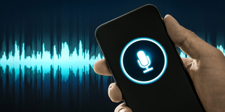 Microphone icon representing AI voice scam risks for businesses.