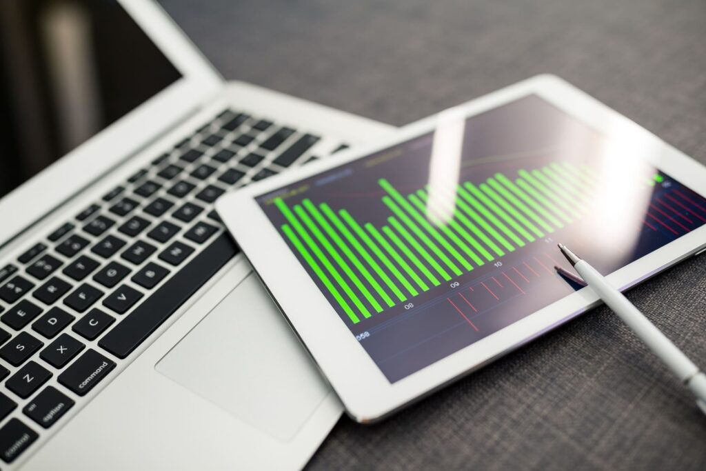 modern-business-workplace-with-stock-market-data on tablet