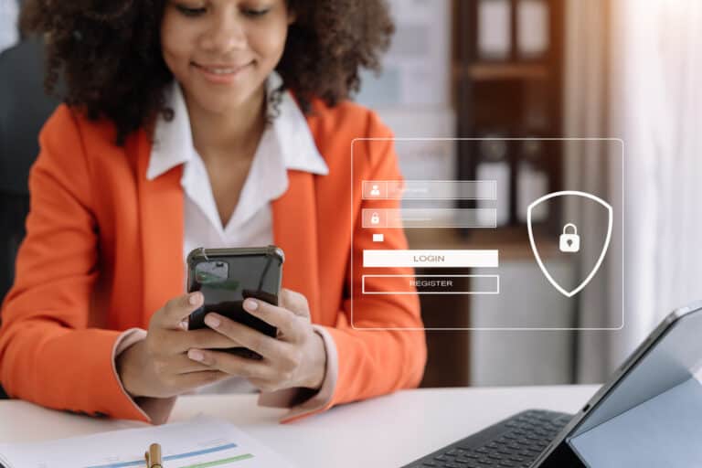 Woman typing login information