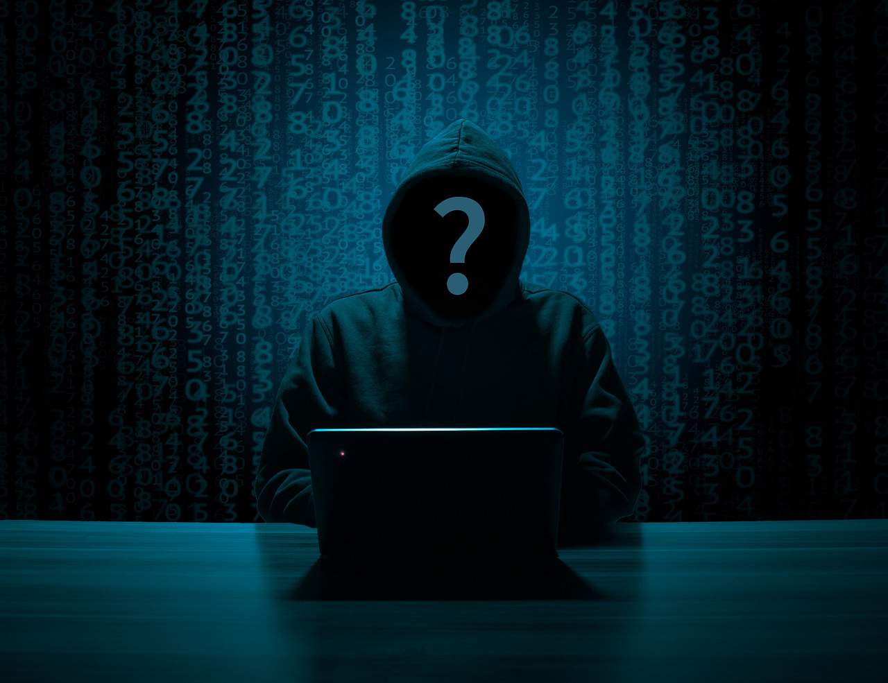 A person with a question mark face sits in front of a laptop with numbers in the background. 