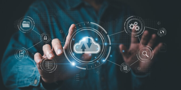 A person on a laptop, representing a successful zero-downtime cloud migration without chaos.