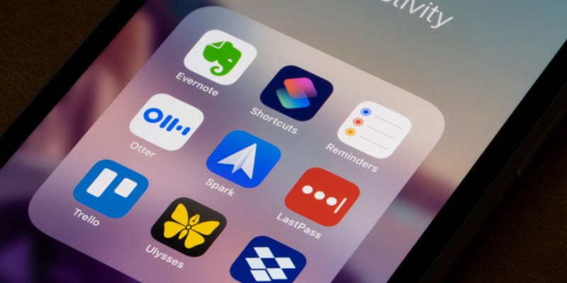 Image of various productivity apps seen on an iPhone illustrates how to choose a productivity app.