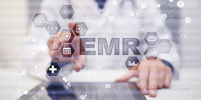 An IT pro uses a modern EMR, showcasing improved productivity and secure data management.
