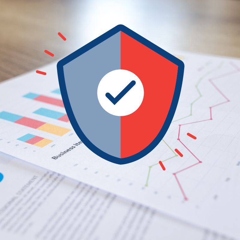 Financial advisors reviewing a year end IT and cybersecurity checklist in a conference room. IT and cybersecurity for financial firms