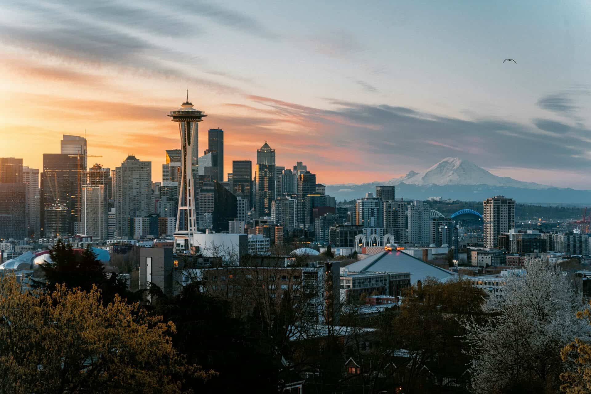 Landscape view of Seattle's downtown skyline featuring Mount Rainier and the Space Needle