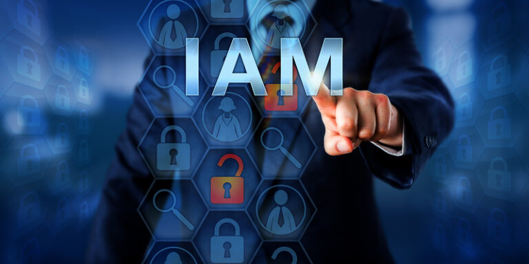 A security manager presses a glowing "IAM" (Identity and Access Management) button on a virtual touchscreen, symbolizing the implementation of a business security solution.
