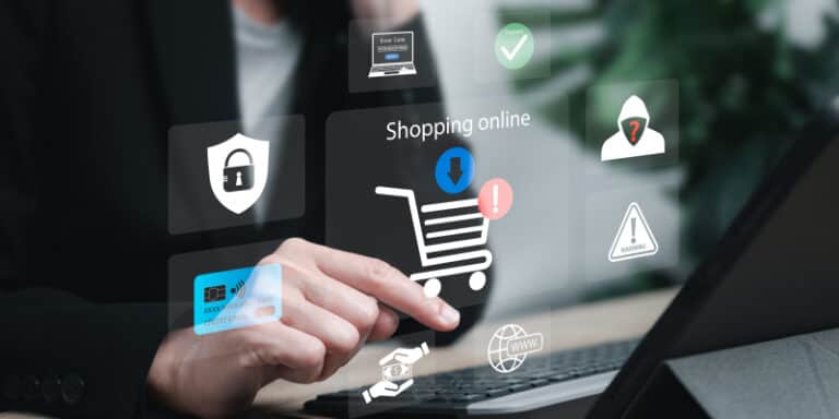 A person using cybersecurity to secure retail e-commerce data on a laptop.