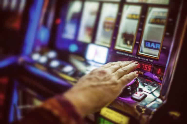 Person playing a slot machine
