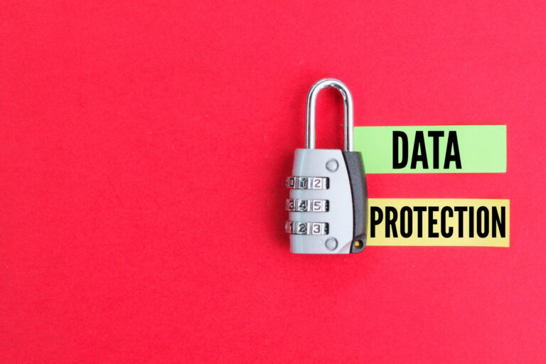 Combination padlock on red background with words data protection