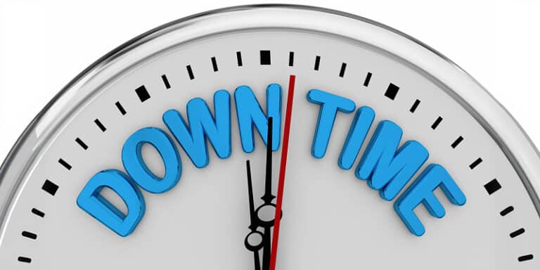 Clock with the words “down time"in blue color showing IT system downtime and business disruption for small and mid-sized businesses.