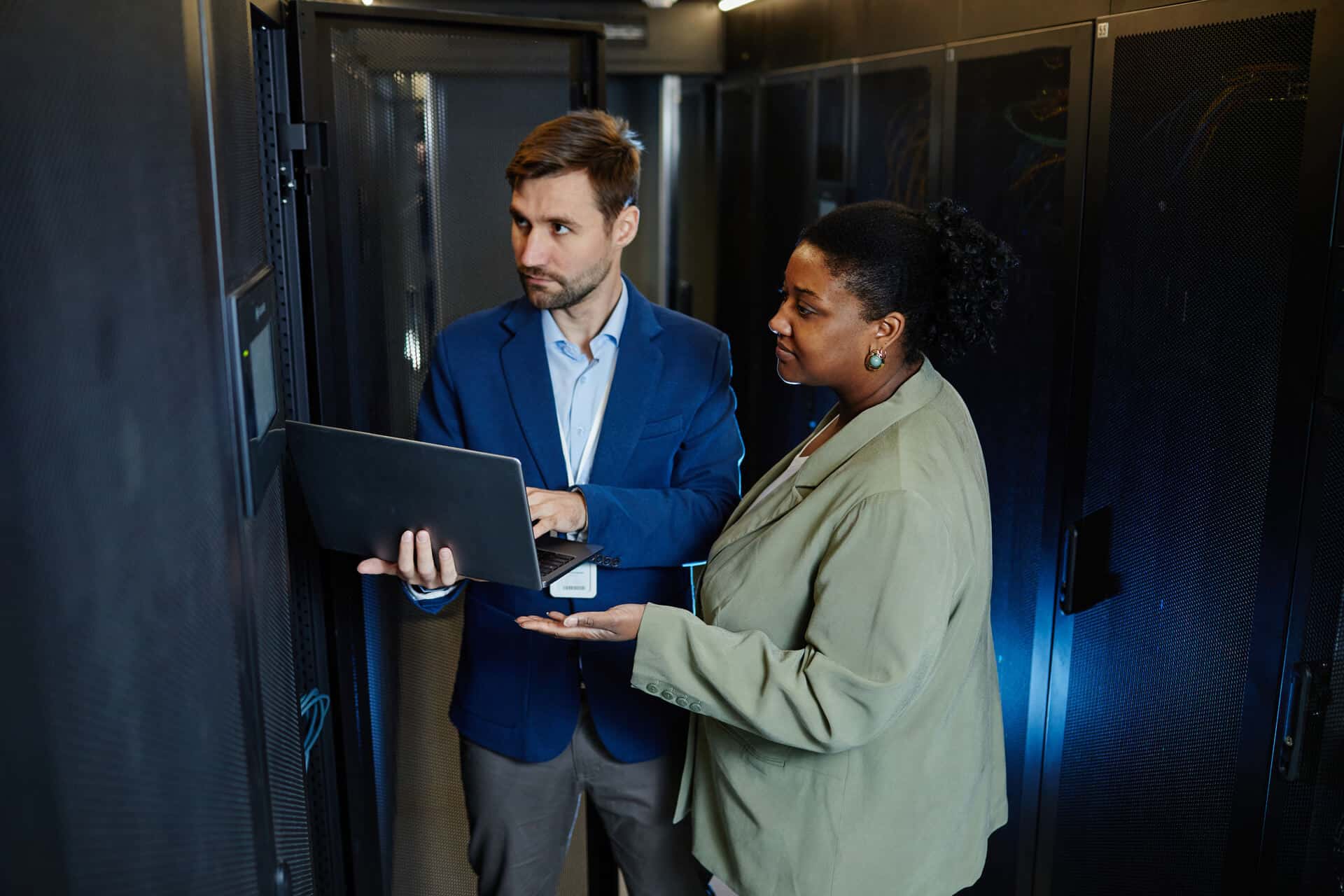 system-managers-in-server-room-2023-11-27-05-13-19-utc 1 1