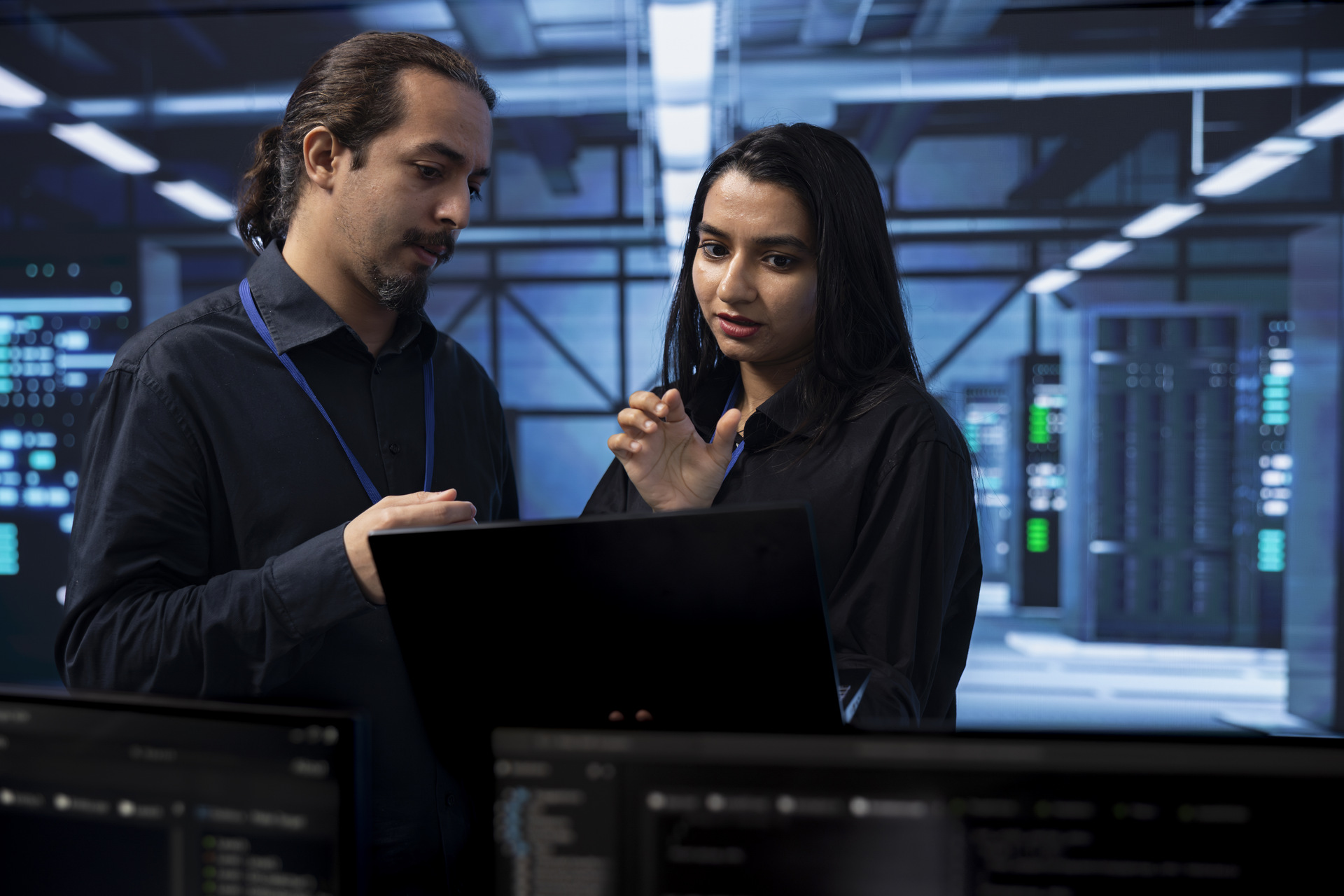 coworkers in server hub workspace fixing errors