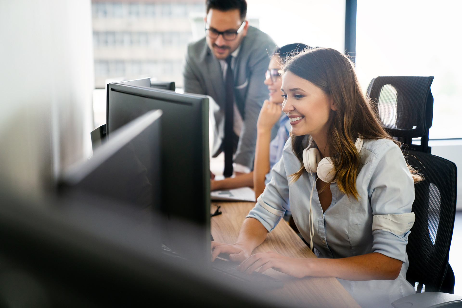 programmers cooperating at it company