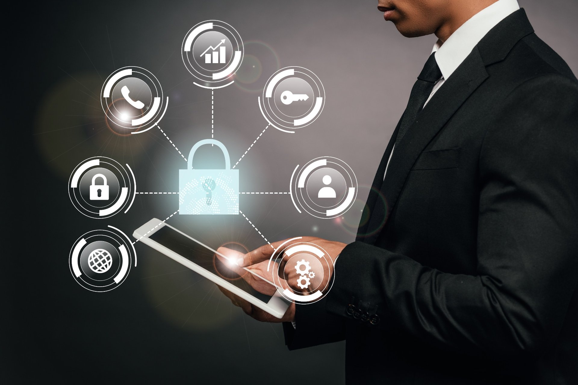 Businessman with tablet and digital lock icons