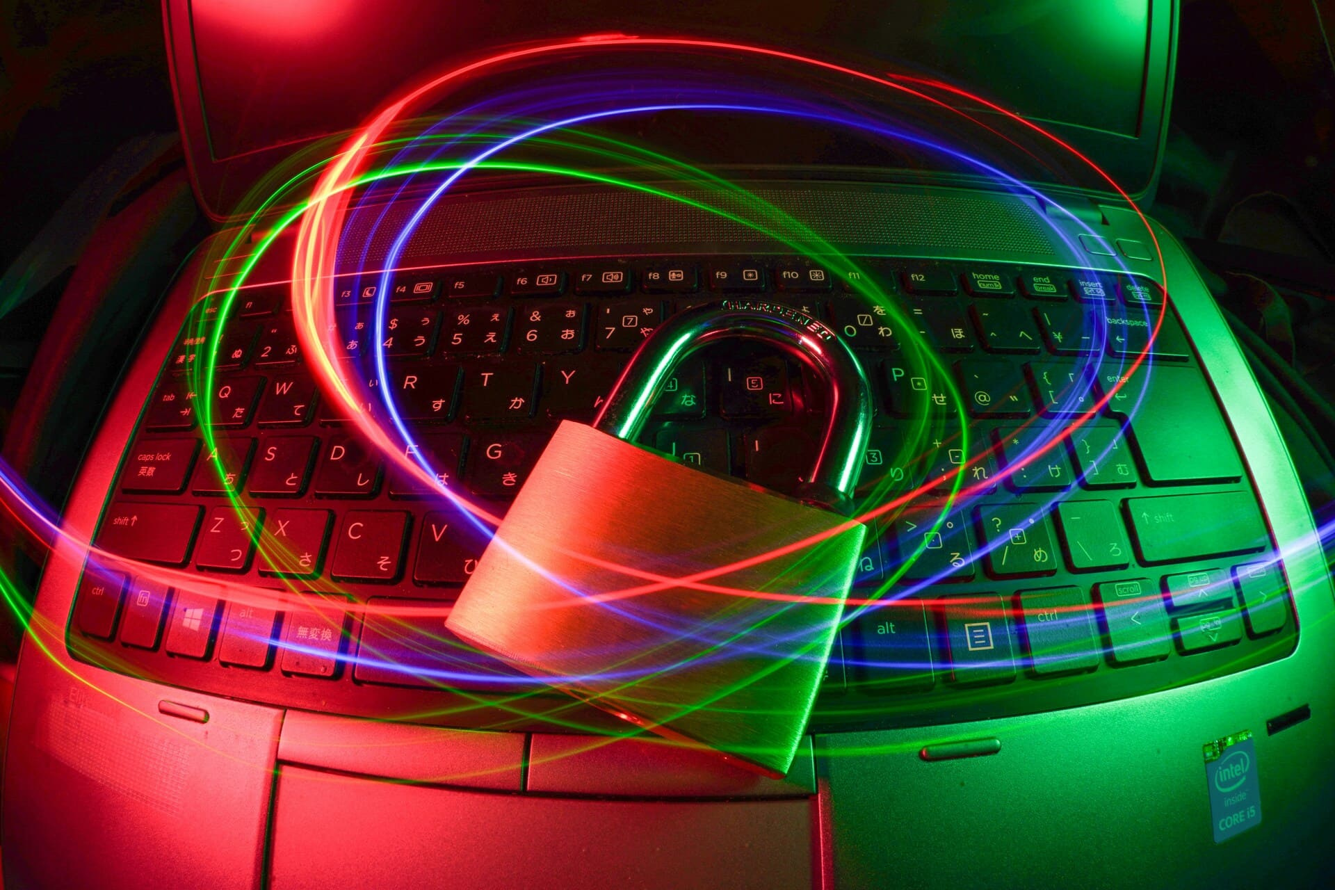 Network Security Threats - Man using AI software on laptop with digital background