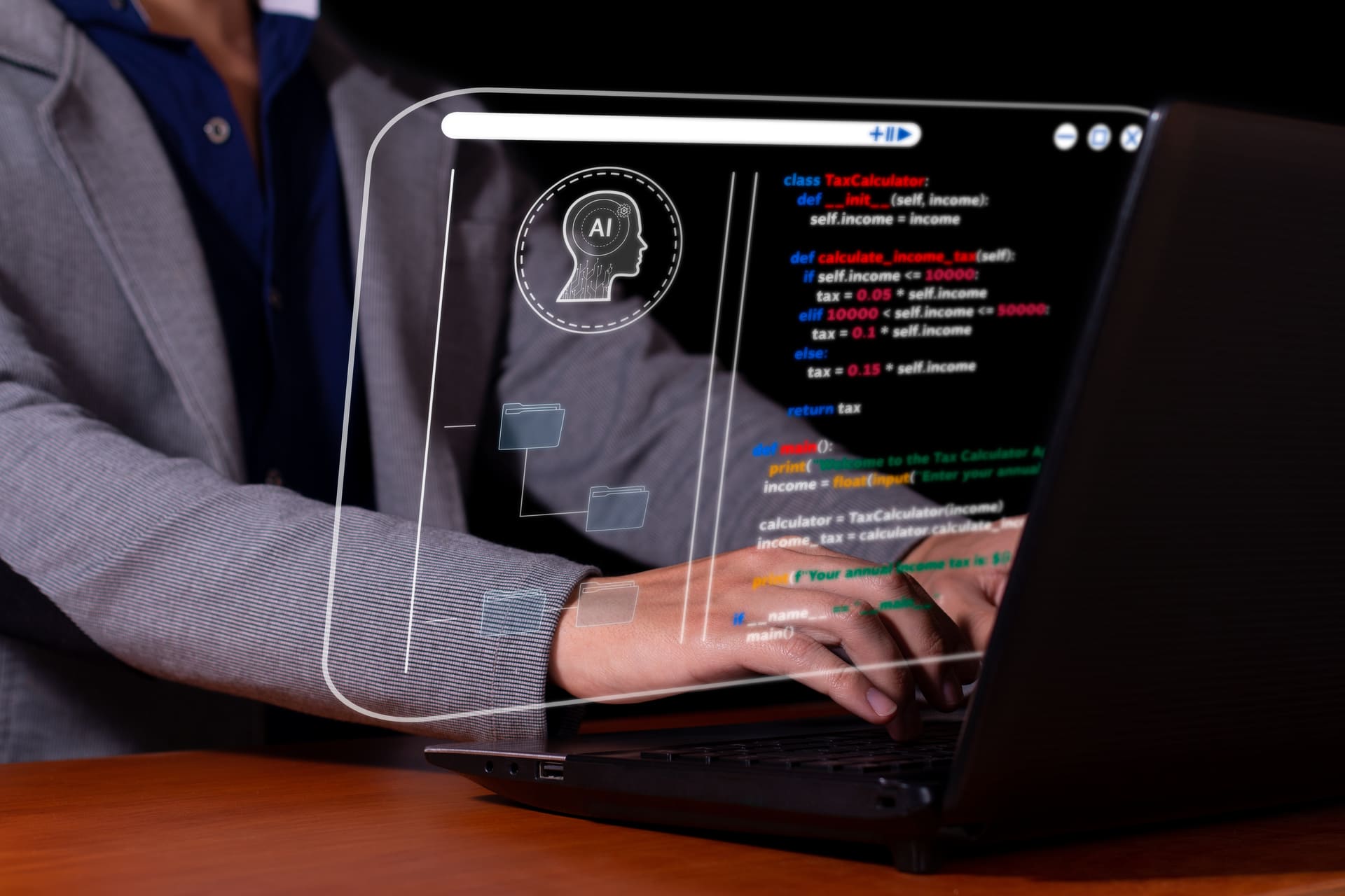 Developer coding on laptop with AI hologram interface