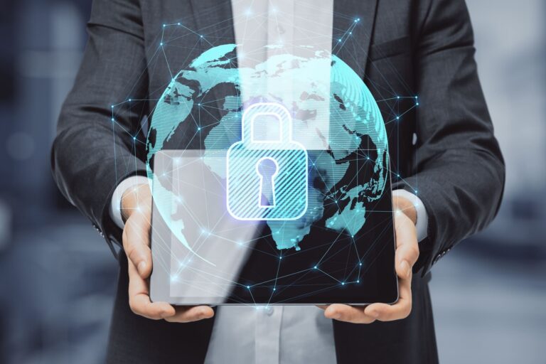 Hands holding tablet with glowing data security graphics